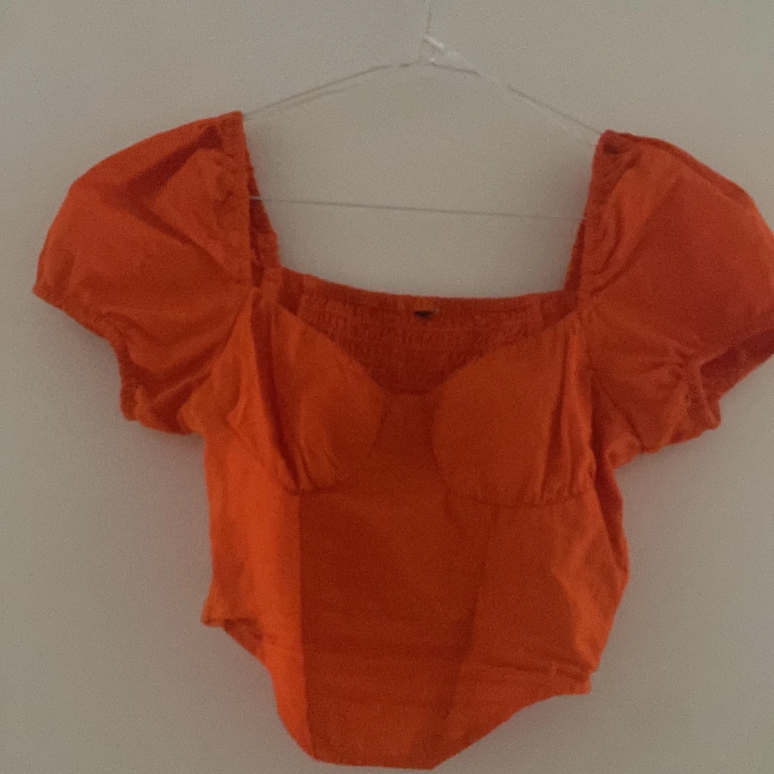 Orange korsett tröja