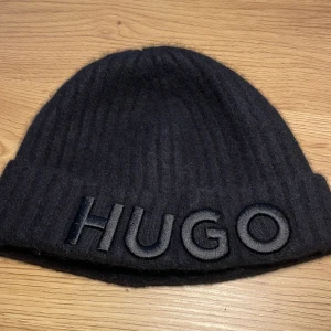 Hugo boss mössa   - Ny utan pris lap använd en gång och har inga skagod eller märken 