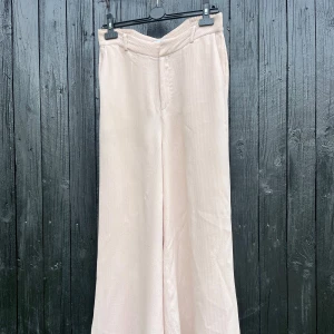 Rodebjer trousers  - Wide legged Rodebjer trousers, size 40. Slightly pink. 