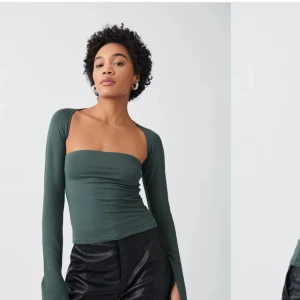 Soft touch square neck top - En trendig grön långärmad topp med slits vid armarna, storlek XS (stor i storlek) från Gina Tricot i mycket bra skick. Använts få antal gånger. Säljer den då den inte kommer till någon användning! Nypris 259,95 SEK, sälj för 150 (pris kan diskuteras)