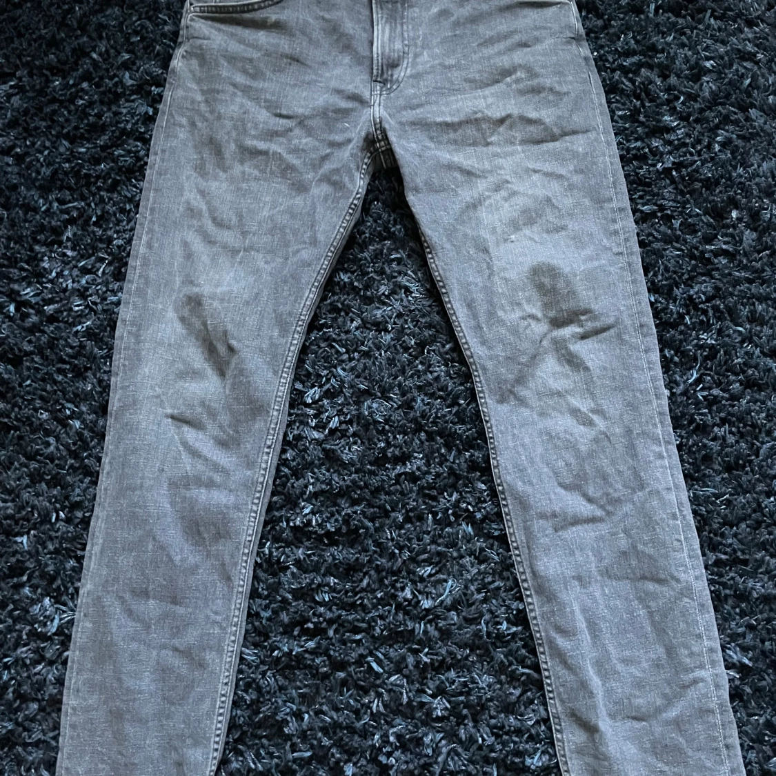 Grå jeansbyxor från Lee