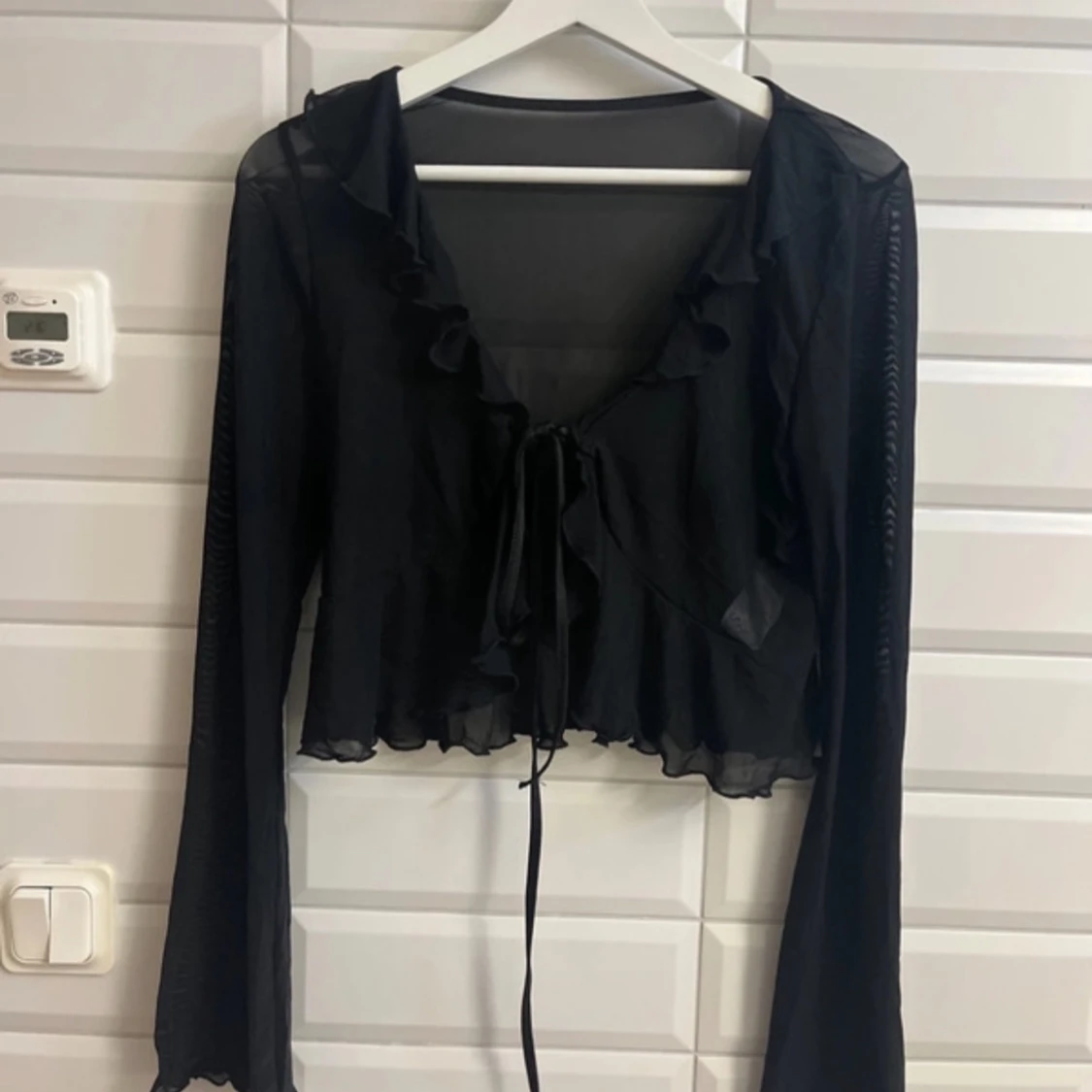 Svart bolerotopp från Shein storlek:L