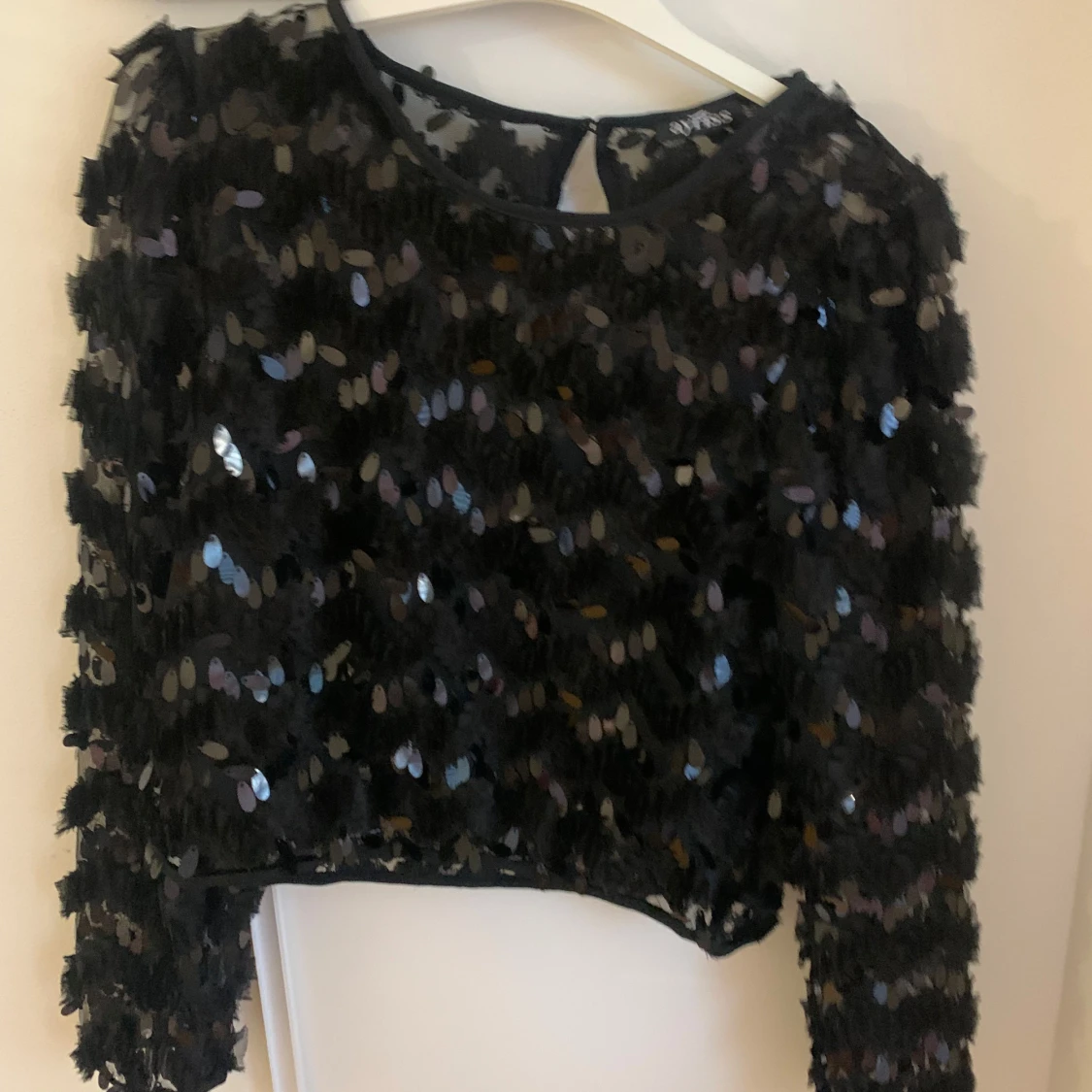Svart paljettopp  - 91