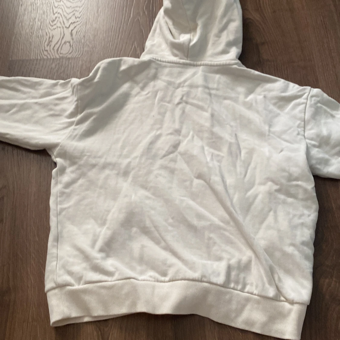 Vit hoodie från KappAhl med Arizona-tryck - 90