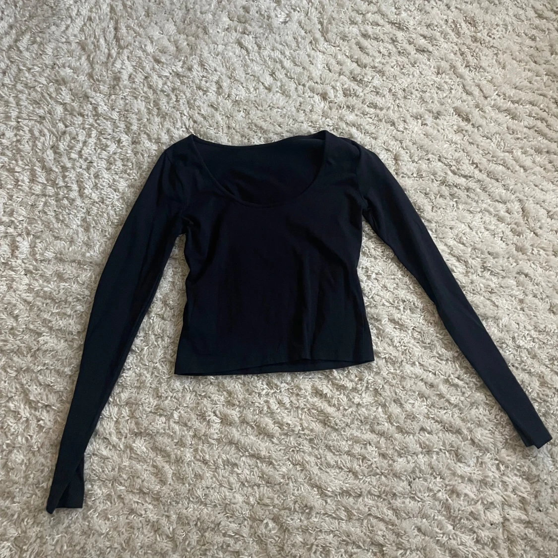 Svart långärmad topp från Gina Tricot