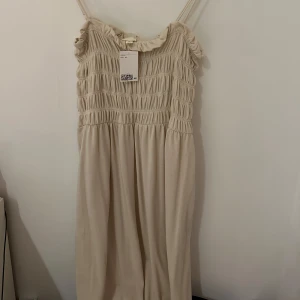 Långklänning  - Långklänning från HM, aldrig använd 