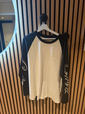 cortiez long sleeve - never worn it, its to small.   I am 193 cm 