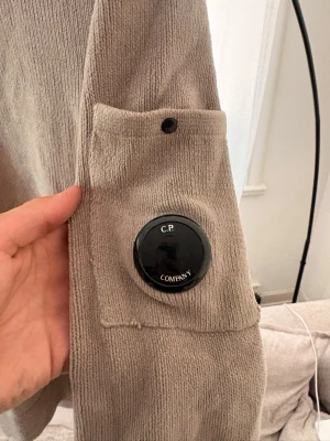 C.P. Company Sweater  - Good condition (small hole next to the collar”. Size 48 could fit a 50 for a snugger fit.
