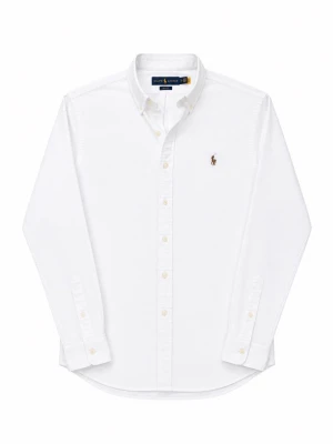 Vit skjorta från Ralph Lauren - Klassisk vit skjorta från Ralph Lauren med button-down krage och broderad logga på bröstet. Skjortan har långa ärmar, knappar framtill och är tillverkad i bomull för en skön och stilren look. Skicket är 9/10!!