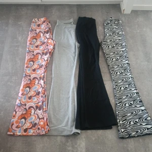 Utsvängda byxor - Stl S dem orange Stl M dem grå Stl S dem svarta Stl L dem grå/svarta 