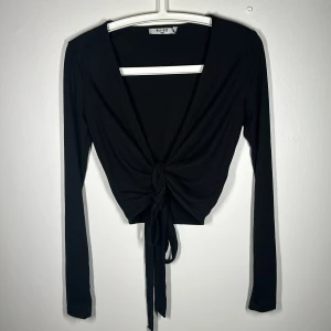 Långärmad top från NAKD - Aldrig använd 