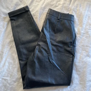 Byxor - Fake läder byxor, använda en gång