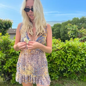 Ruffle Beach Dress - Unique ruffle beach dress with a colorful mesh material and ruffle details 🩵 Throw over your bikini and add some cute sandals for a comfortable and vibrant beach look!