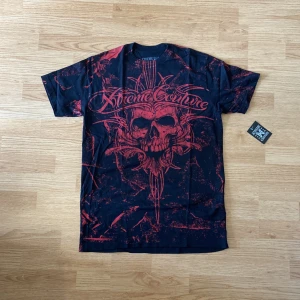 Affliction / Xtreme Couture T-shirt  - !skicka bud för snabb affär! Fet Xtremecouture T-shirt, gjord av Affliction. Helt ny aldrig använd me tags 🤩Storlek M. Skriv om ni undrar någonting eller om ni vill ha fler bilder 📲