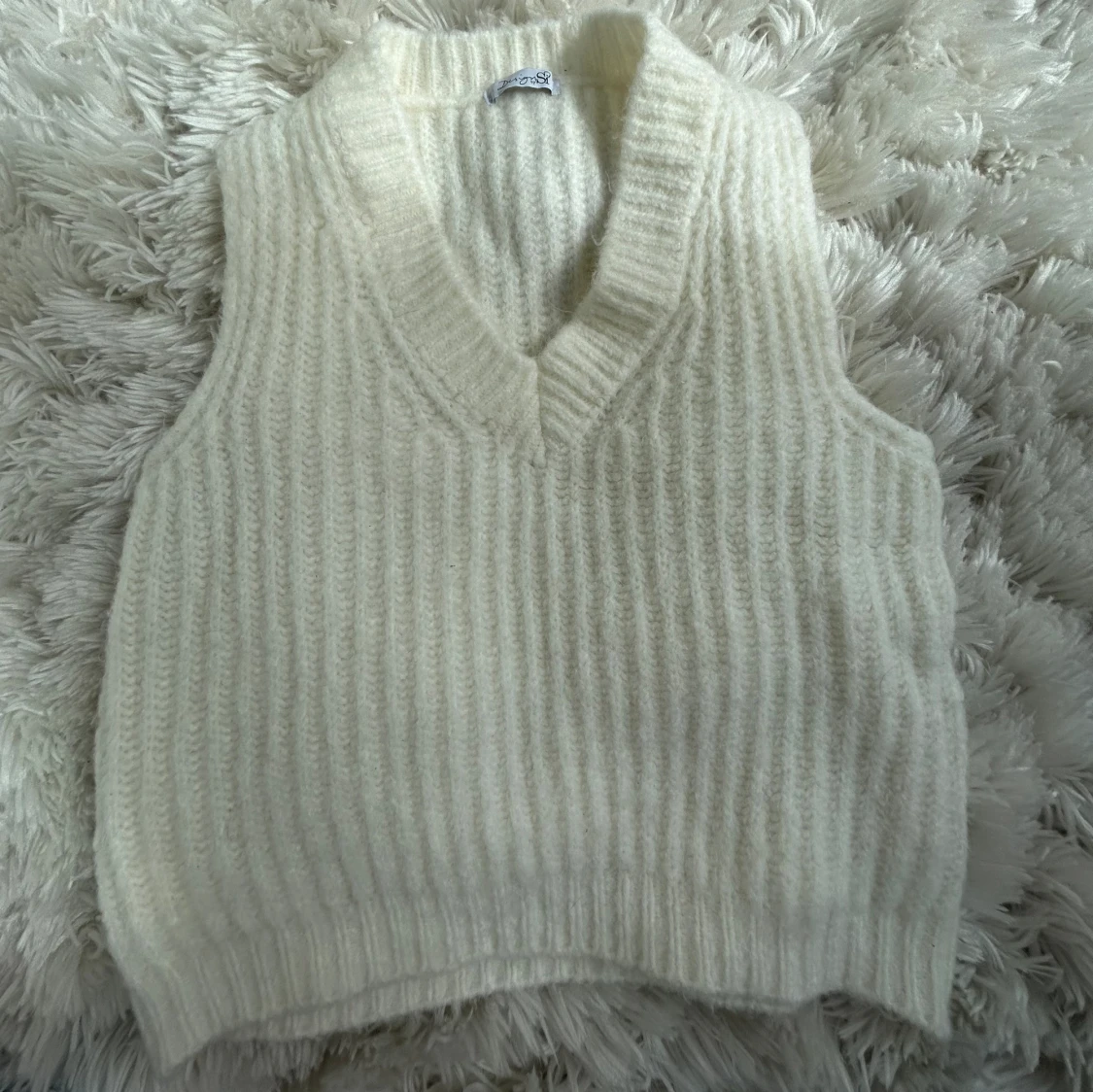 Stickad väst - 90
