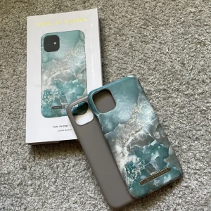 Mobil skal - Två st iPhone 11 skal. 1 från ideal of sweden och det andra från Holdit. Båda i fint skick, man får med ideal of sweden förpackning