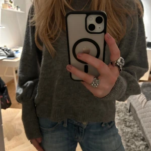 Stickad tröja  - Grå stickad tröja från NAKD i fint skick. Väl använd. 