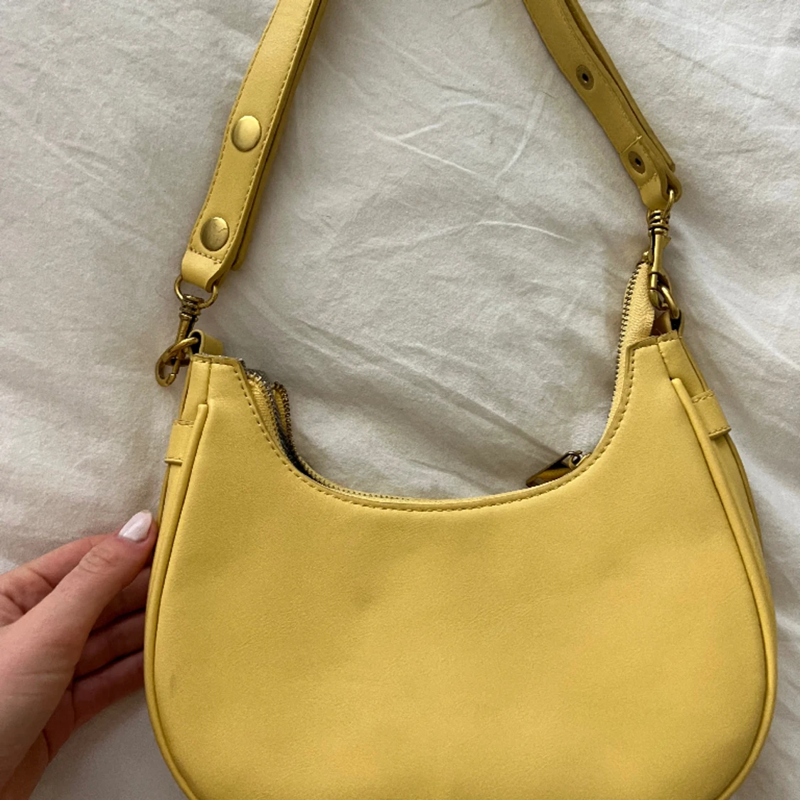Yellow clutch bag bought in Paris