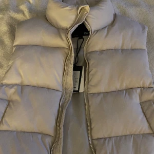 Väst  - Väst från lager 157 Sitter som s/m