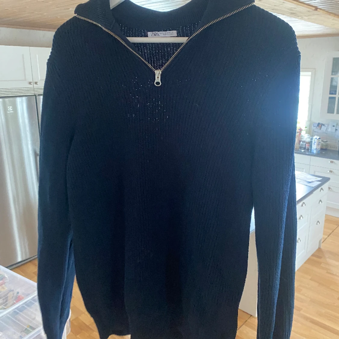 Stickad half-zip tröja