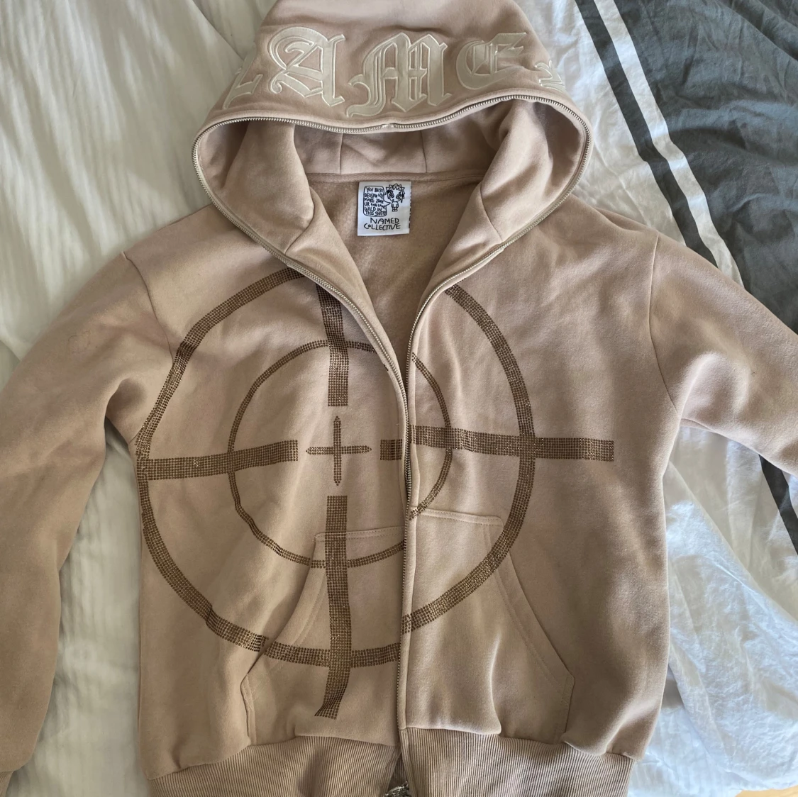 Named collective zip up