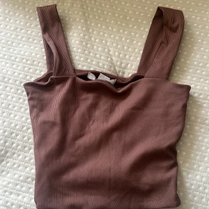 Topp - En topp från new yorker. Som blivit andvänd 1 gång