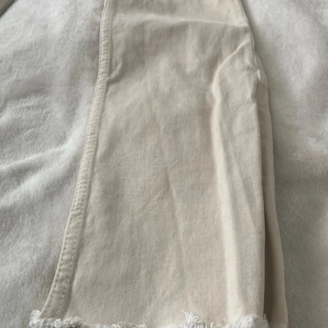 Crémefärgad jeans - 90