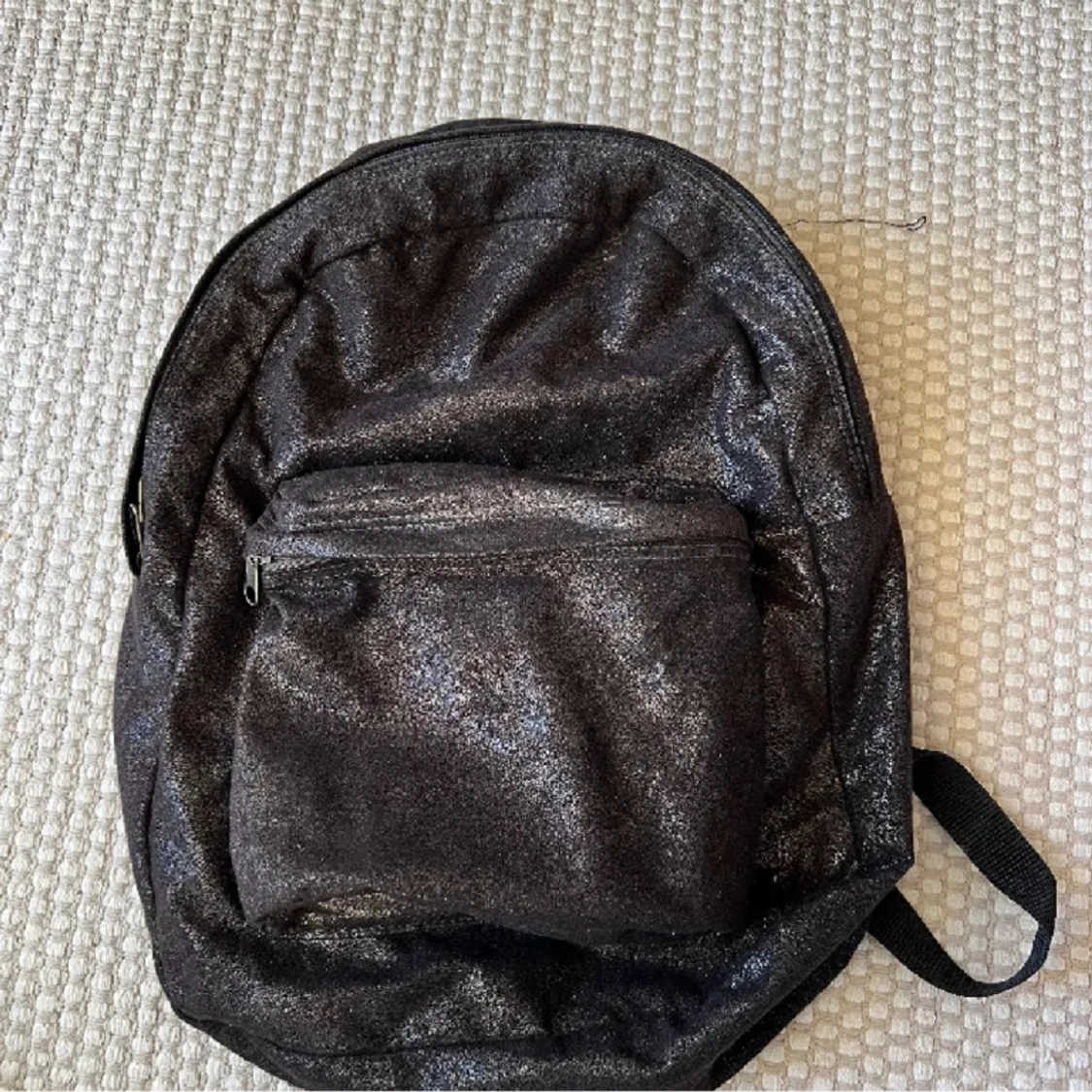 Glittrig ryggsäck 