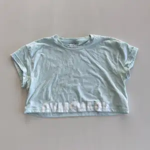 Turkos croppad tröja från gymshark. (Bomull/ t-shirt material) 