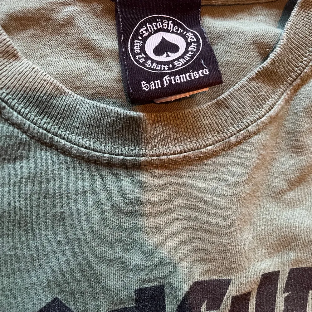 Grön Thrasher T-shirt i storlek S, i gott skick.. T-shirts.