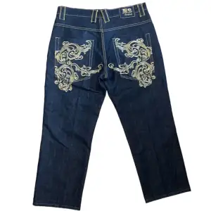 Vintage M2 baggy jeans [Ytterbenslängd 102cm] [Innerbenslängd 75cm] [Midja 48cm] [Benöppning 25cm]