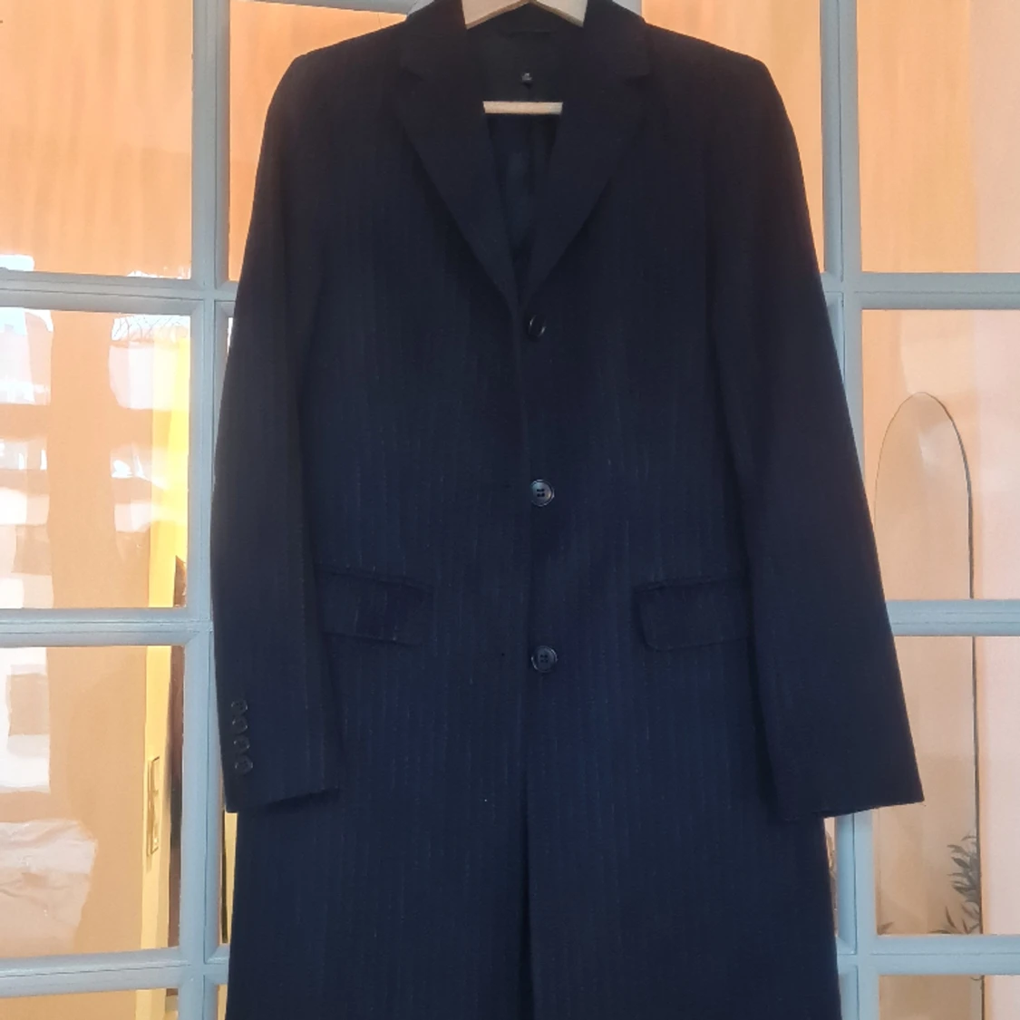 Kritstrecksrandig kappa