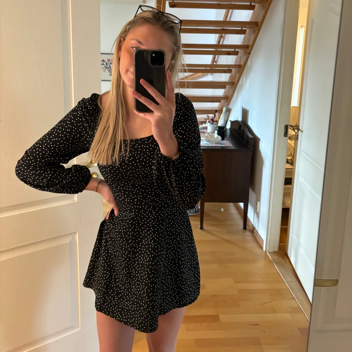 Långarmad klänning