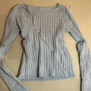 Tröja -  Ljus Blå cardigan från New yourker storlek 36-38 