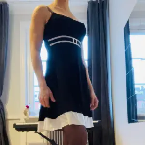 Black&white dress from Italian brand, very good condition. One size, fits XS-M, adjustable shoulder braces.