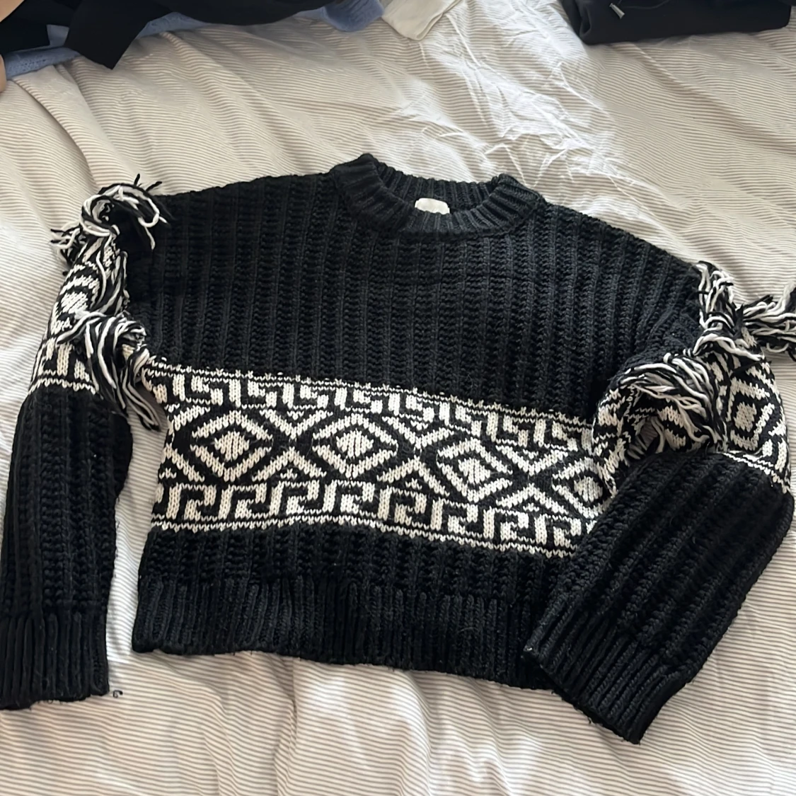 Stickad tröja