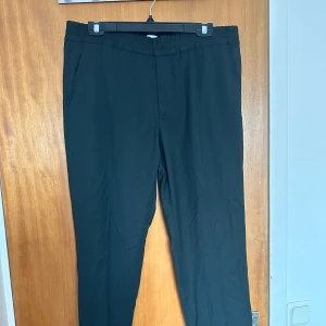 Kostymbyxor  - Mörkgröna kostymbyxor 