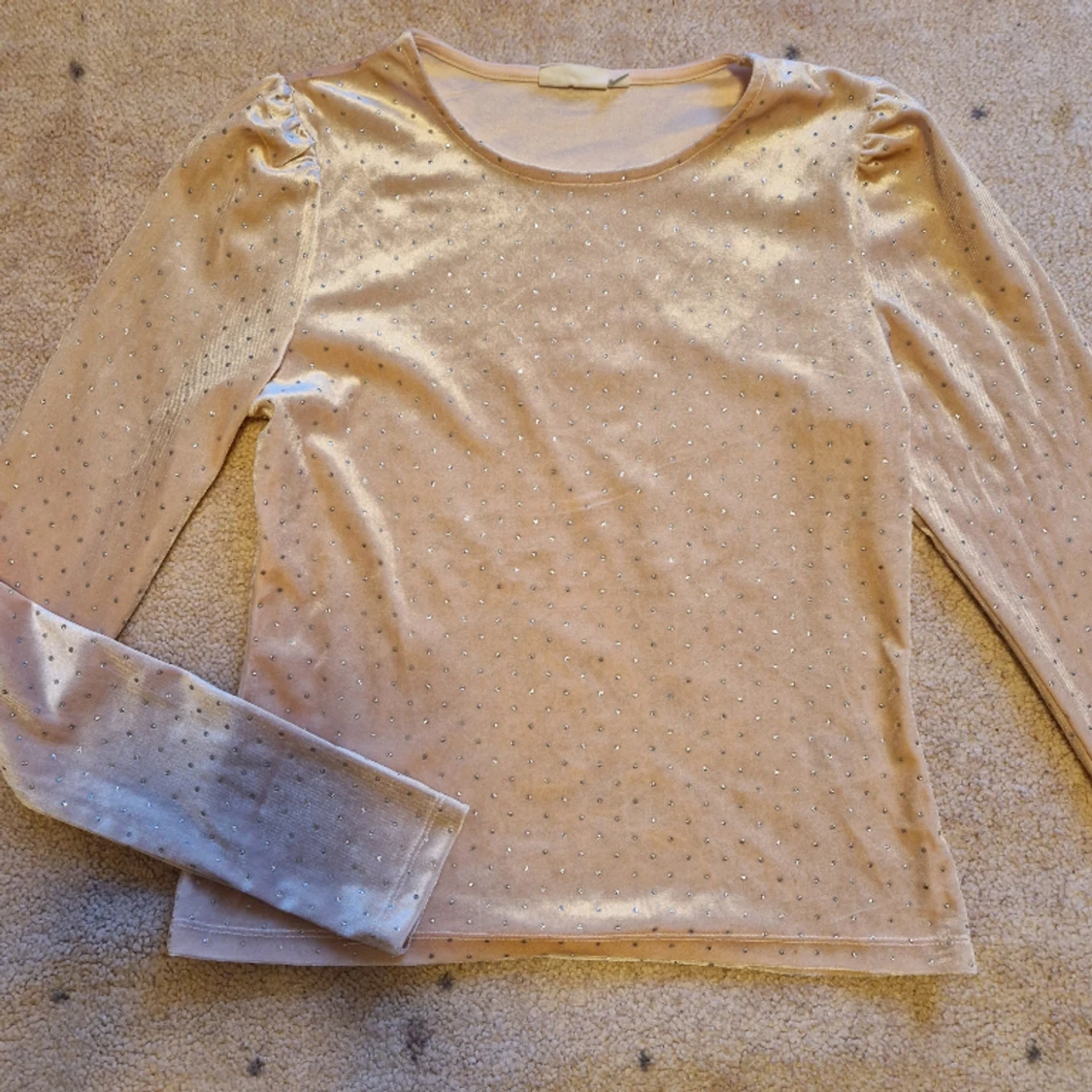 Glittrig oanvänd rosa topp