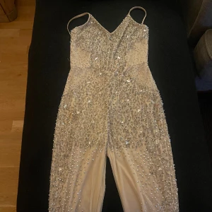 Jumpsuit  - Zalando märke  Small / 36 / 8  Low back   Pink : beige  Silver glitter 