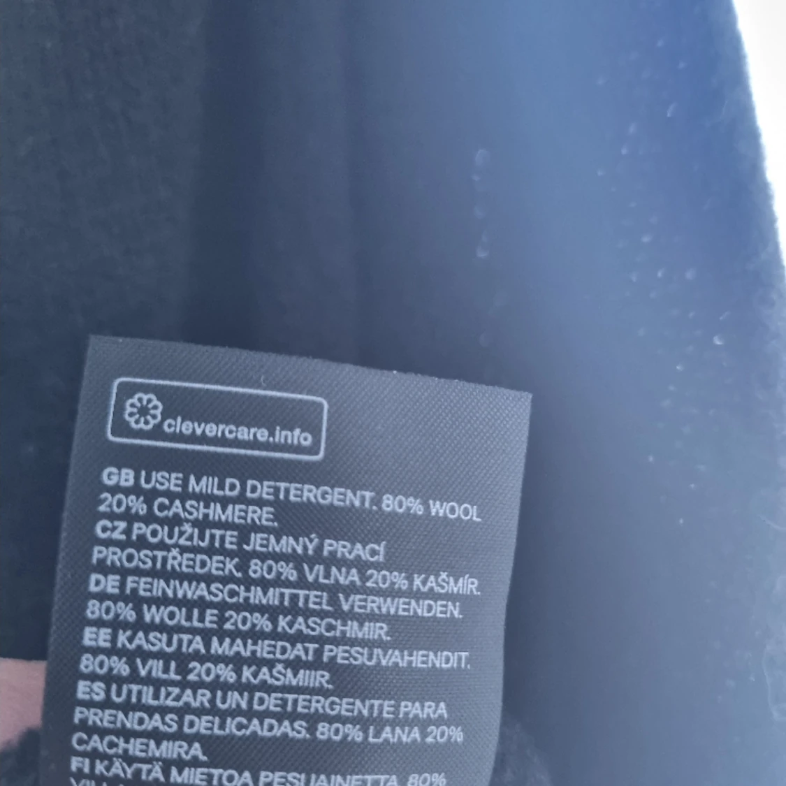 Svart poncho från H&M  - 91