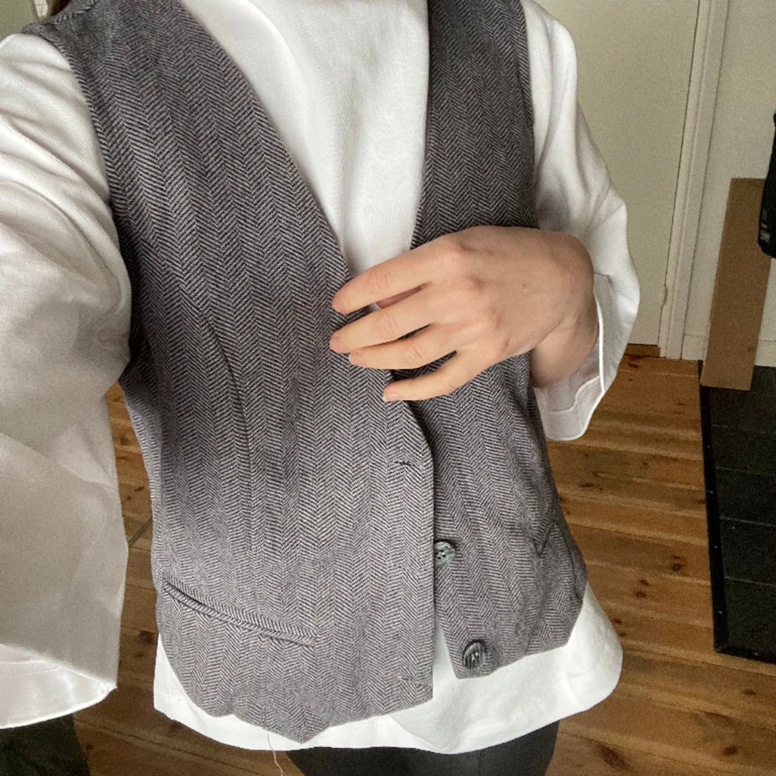 Grå väst - 91