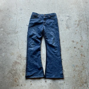 Hybrid Denim - Crafted from a pair of vintage flared denim on the front and soft flared sweatpants on the back.