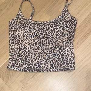 Leopard linne - Skick:som ny den är använd 1 gång