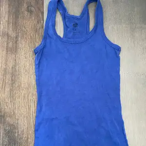 Ett blått linne, använt men fint skick