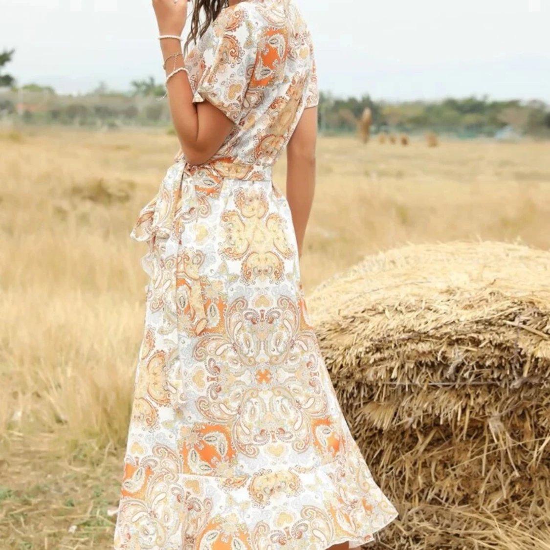 Mönstrad omlottklänning  - 91