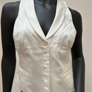 Vit väst - Vit väst. Ny, aldrig använd. 