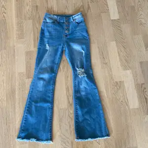 Blå lågmidjade bootcut jeans i barn size