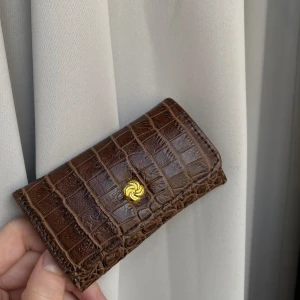 Nyckeln fodral/plånbok - Nyckel/plånbok i jätte fin skick🤎