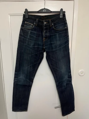 Nudie jeans salvage  - Modell grim Tim , mycket fina slitningar i tyget dry selvage. Säljer då de är för korta för mig. 