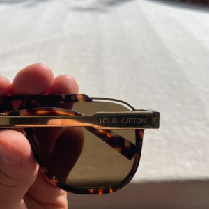 Louis Vuitton solglasögon Mascot modell - Snygga solglasögon från Louis Vuitton. fint skick kan skickas